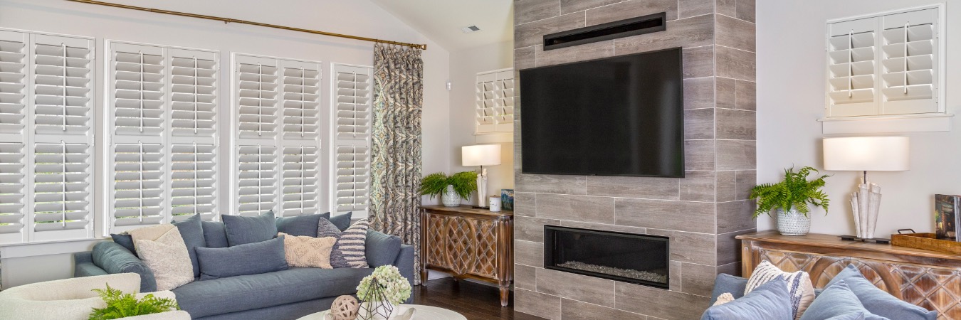 Interior shutters in Santa Clara living room with fireplace