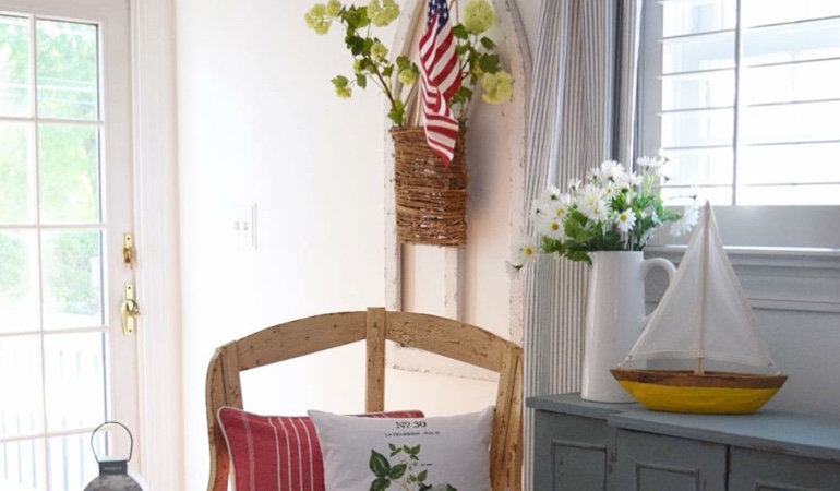 Bright sitting corner with faux wood plantation shutters in San Jose. Faux wood plantation shutters in San Jose