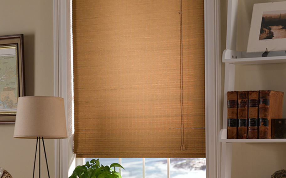 Add a touch of nature to your decor with woven fiber shades in San Jose. Tan woven fiber shades in a living room