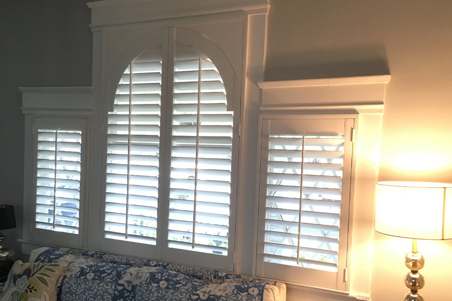 Install elegant and classy Polywood shutters for your special-shaped windows. White polywood Pallidian shaped windows.